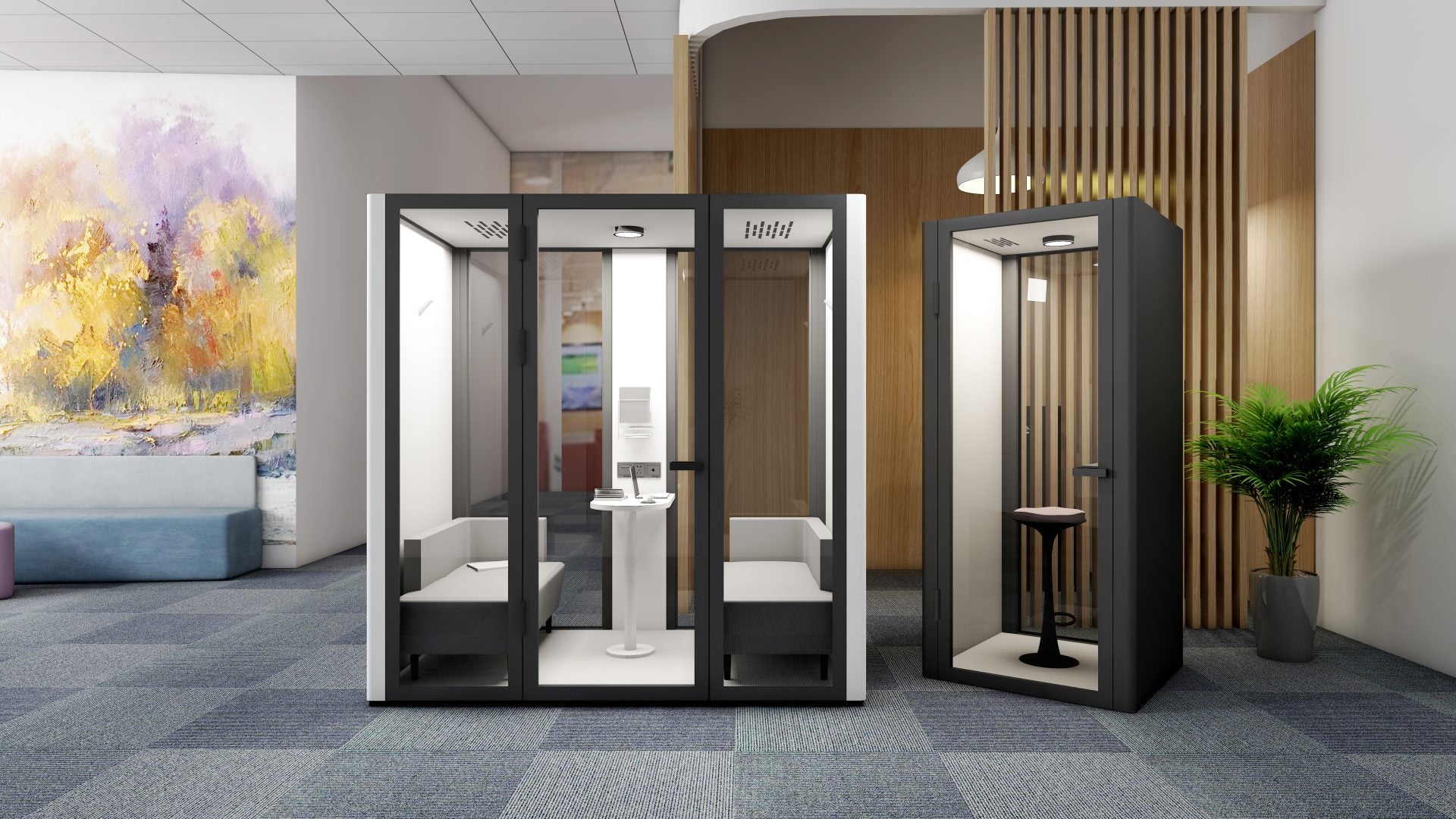 B.Quiet acoustic pods in a modern office environment